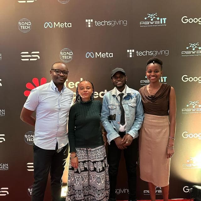Godwill Barasa with three other attendees at a technology event in Nairobi